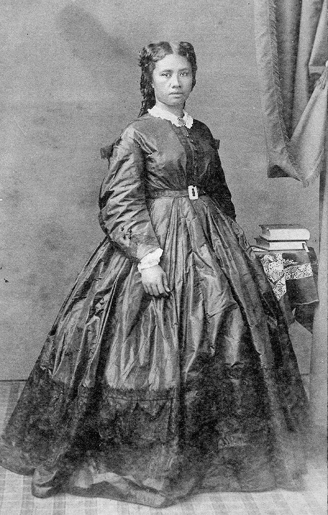 Queen Lili’uokalani (then a Princess) in her late twenties, c. 1865, about one year before she composed the former Hawaiian national anthem, “He Mele Lahui Hawaii,” (“Song of the Hawaiian Nation”). Credit: Charles Leander Weed, Public domain, via Wikimedia Commons